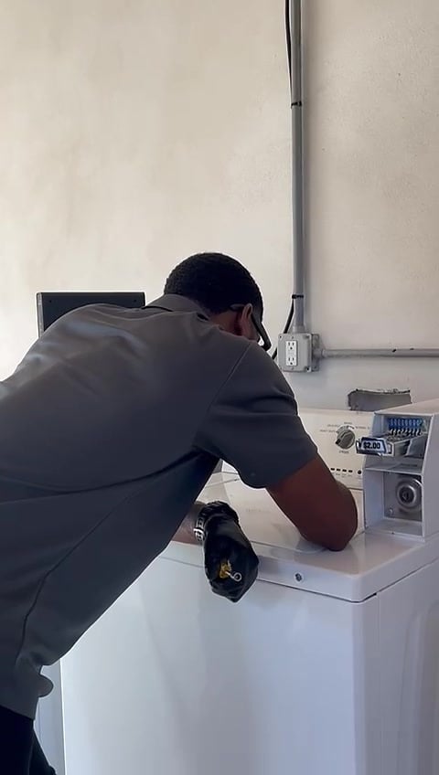 Working inside a washing machine control panel